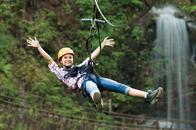 7 Line Waterfall Canopy Zipline Course - Flying over the lost mine waterfall and creek