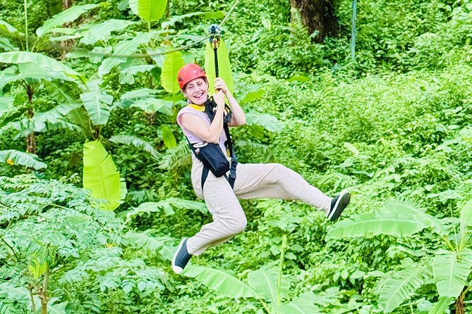 Chiang Mai 3 in 1 Zipline, Elephants and Sticky Waterfall - Elephant sanctuary time with caretaker supervision: feeding, walking, and river moments