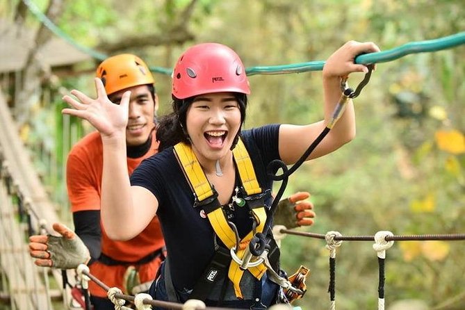 Chiang Mai Zipline White Water Rafting and Elephant Sanctuary - Zipline over the dam: Old City views and jungle scenery from above