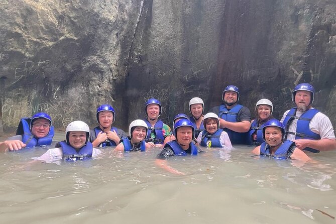 Combo Zipline & Waterfalls - Getting geared up: life jacket, helmet, bottled water, and a forest intro