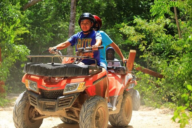 Day Tour with ATV, Zipline and Cenote Adventure from Cancun - The cenote swim: the star attraction (with a jump vs steps choice)