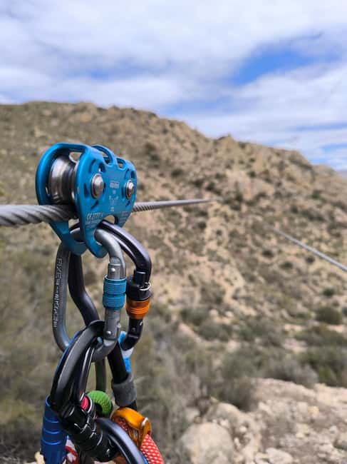 Elda: El Bolón via ferrata with zipline and abseiling - Gear-up at the start: harness, helmet, and the “don’t worry” briefing