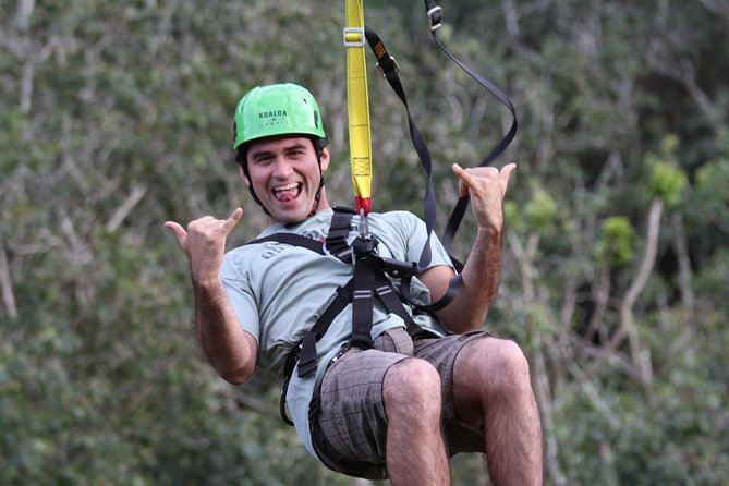 Kualoa Ranch - Zipline Tour - Treetop ziplines: 14 tandem cables, bridge crossings, and the automatic brake