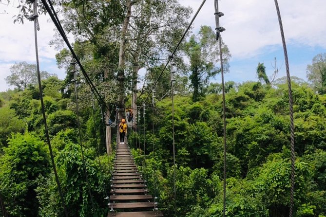 One Day Guided Tour: Kayaking, Zipline & Tubing In The Cave from Vang Vieng - Tham Nam Water Cave: Picnic, Spring Water, and Rope-Assisted Tubing