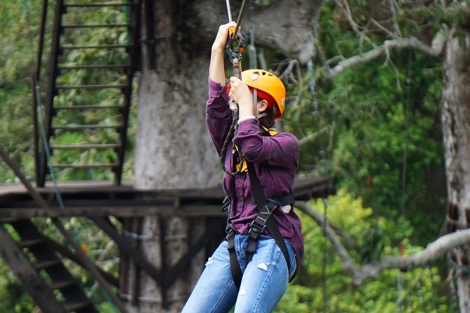 One Day Guided Tour: Kayaking, Zipline & Tubing In The Cave from Vang Vieng - Ziplining Through the Forest: What a Seven-Line Run Feels Like