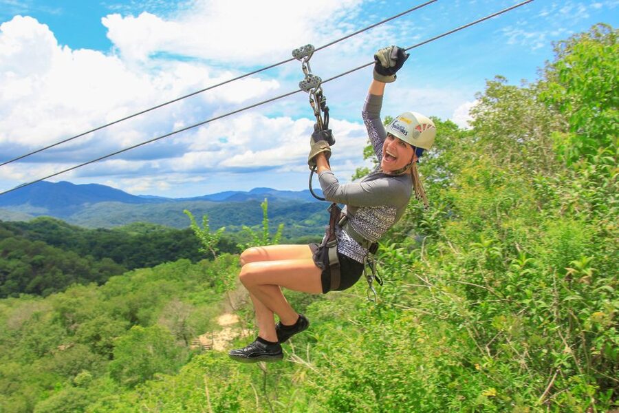Outdoor Zipline Adventure - Ziplines from the Peak: Open-Air Views and Fast Switches