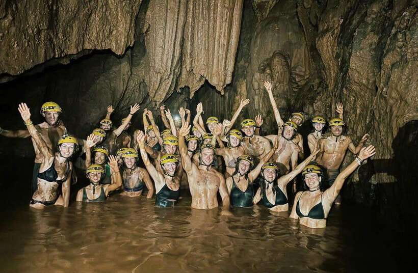 Phong Nha/Dong Hoi: Zipline Dark Cave & Phong Nha Cave Trip - Dark Cave inside: headlamps, walking in darkness, and the sound of stone