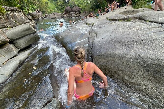 Rainforest Zipline, Luquillo Beach, and Natural Springs Day Trip - Natural springs and rainforest water play: what to expect (mud, wet gear, and stamina)