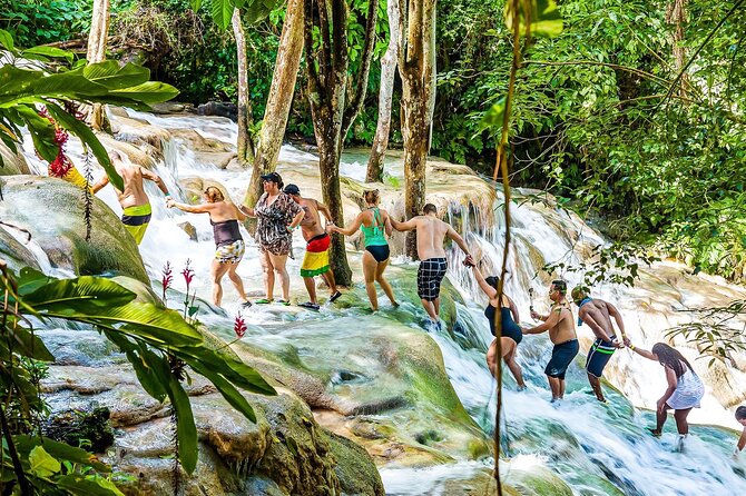 Zipline, Dunn’s River Falls, Bamboo Rafting & Horseback Ride Tour - Dunn’s River Falls: The 600-Foot Climb Up Natural Water Steps