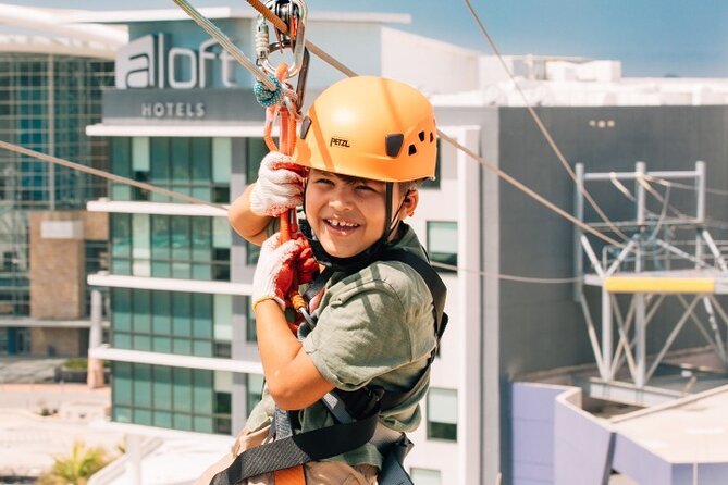 Zipline Sky Bull in Urban Environment in Toroverde urban park San Juan - Sky ride lights and the T-Mobile District vibe